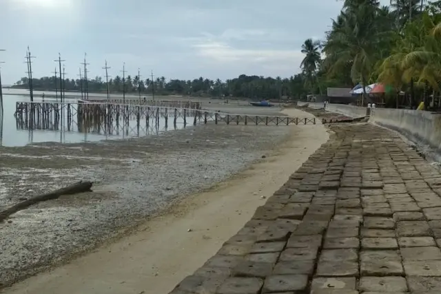 Daya Tarik Pantai Payung